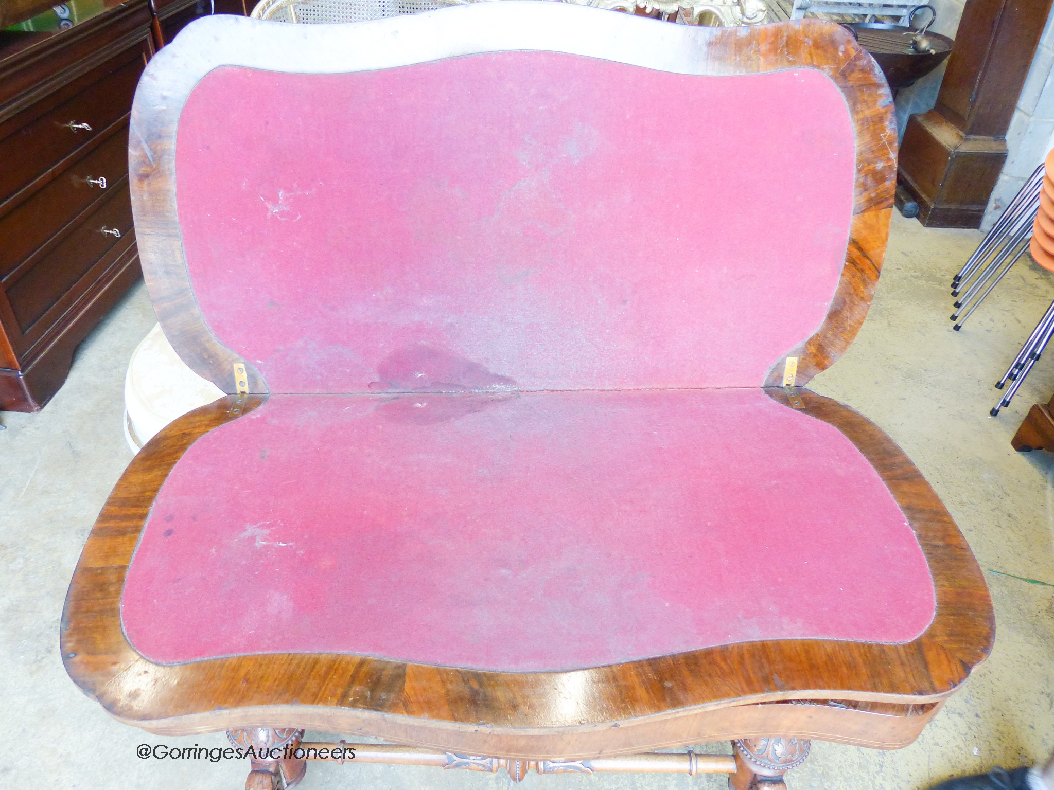 A Victorian inlaid figured walnut serpentine folding top card table, width 97cm, depth 52cm, height 74cm